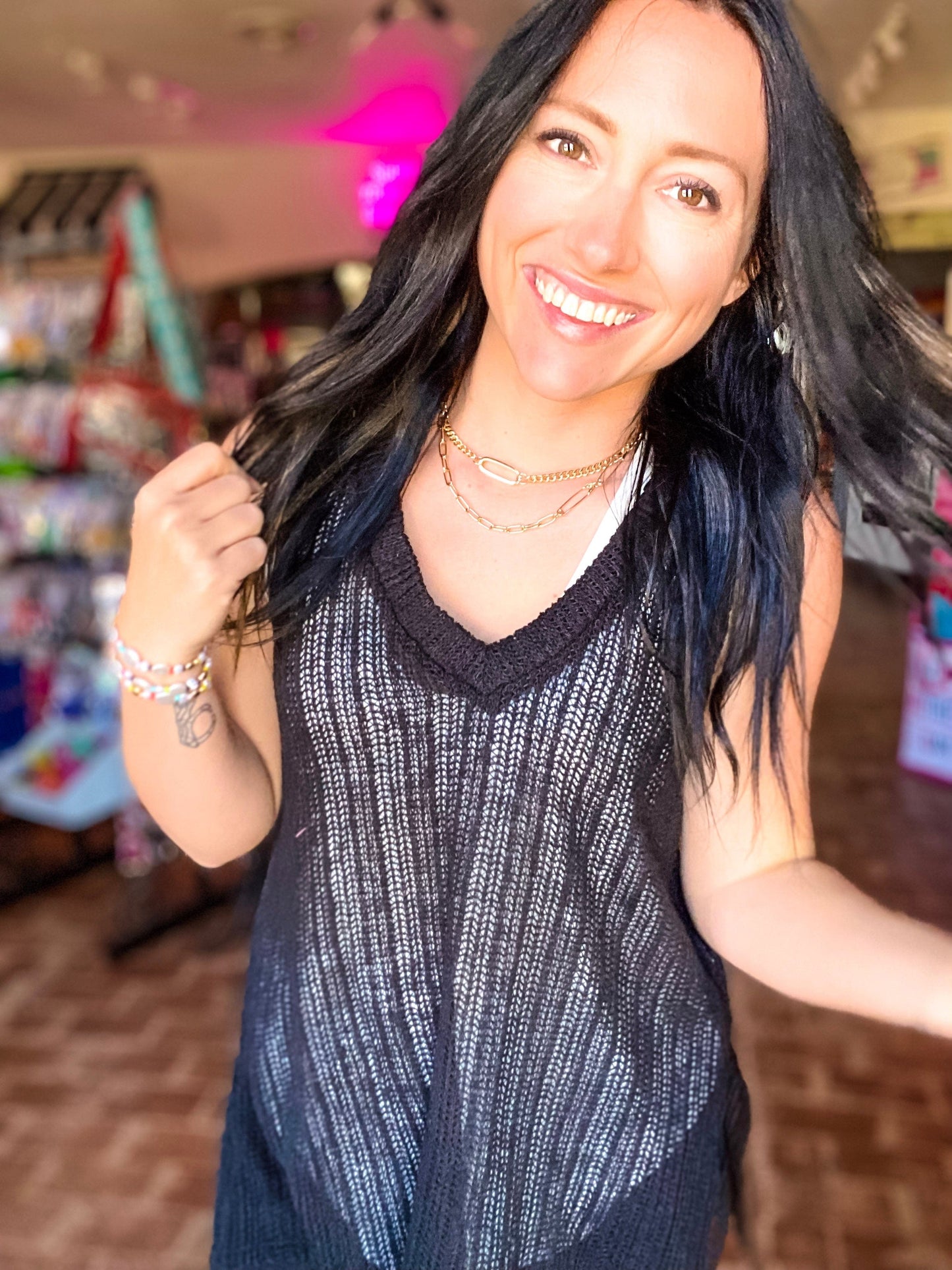 Shirts & Tops Sleeveless Vneck Sweater in Black